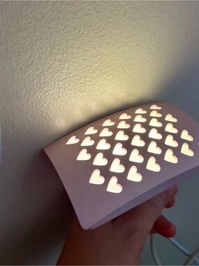 Globe White Plug-In Night Light on Pink Backdrop